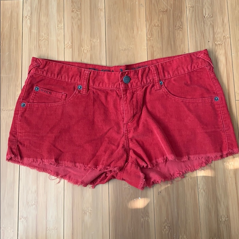 Red cutoff shorts